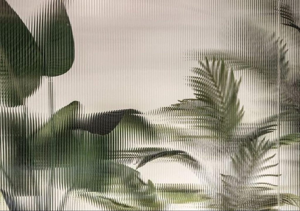 Client visual reference for natural botanical depth behind ribbed glass