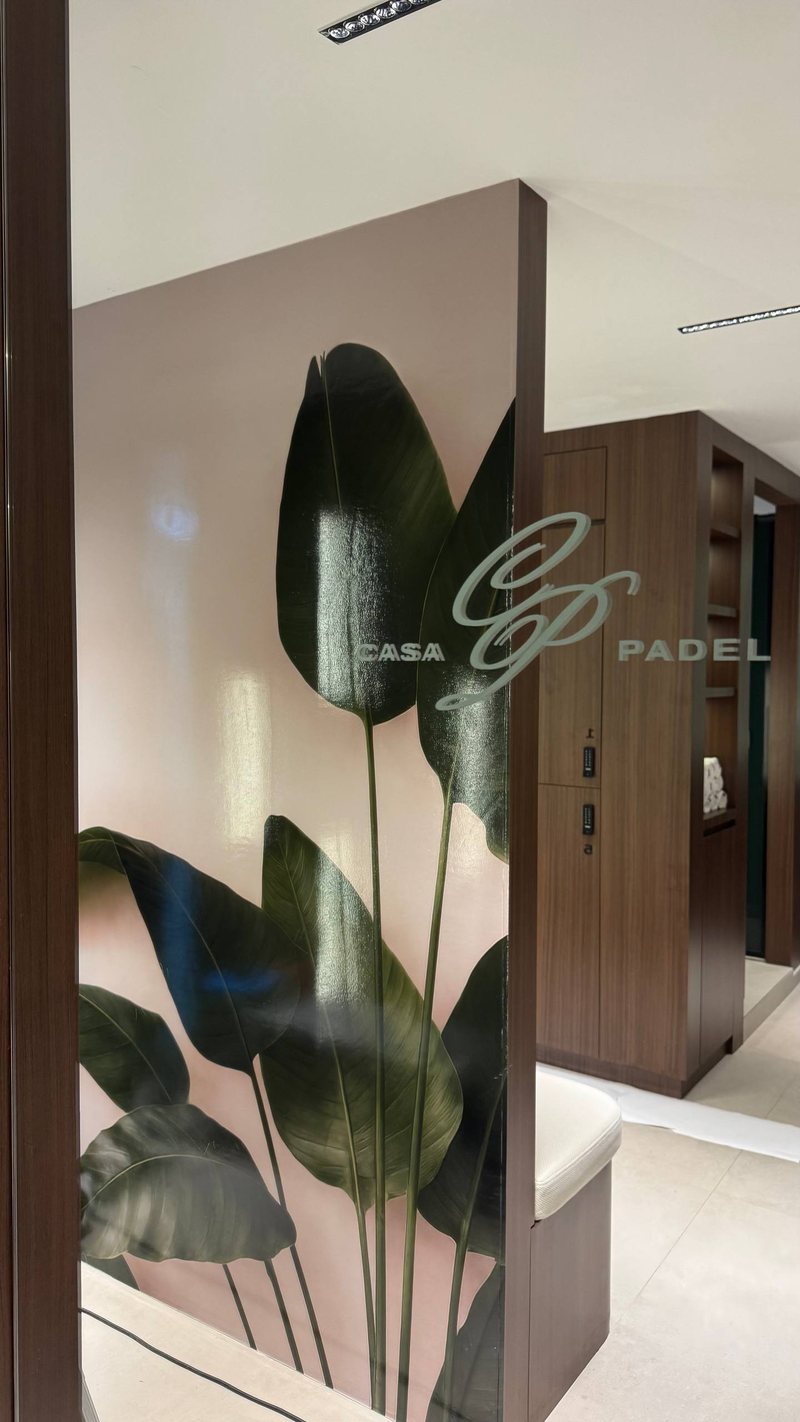 Installed botanical wall graphics at a Dubai Padel Club