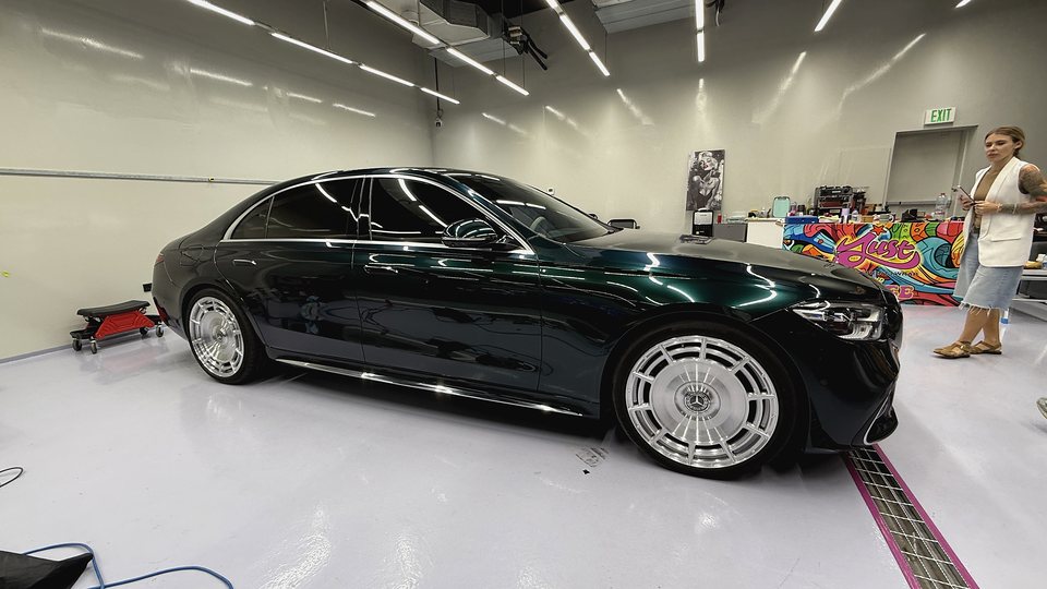 Dark green Mercedes color change completed in the JUST GRAPHICS Dubai workshop