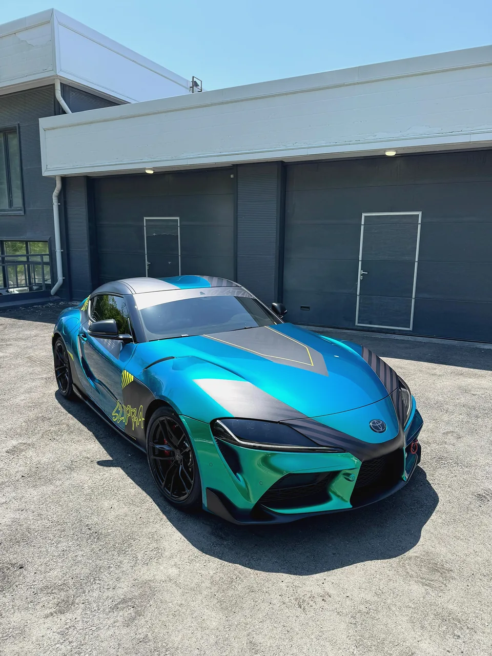 Green and black Toyota Supra designed by JUST GRAPHICS and completed in Vladivostok