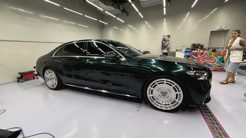 Dark green Mercedes colour change completed at JUST GRAPHICS Dubai