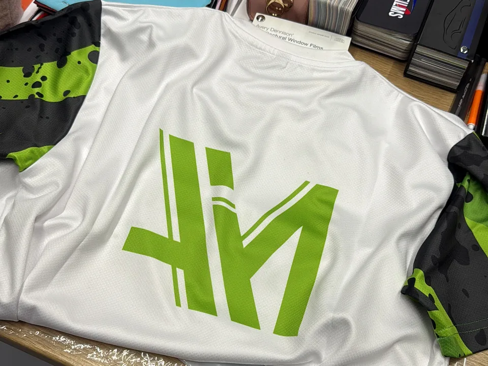 Custom printed performance shirt prepared at JUST GRAPHICS